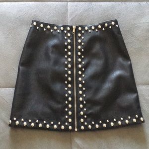 Silver studded black leather skirt